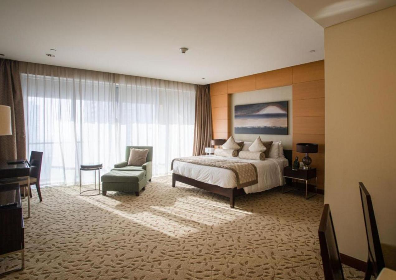 Address Dubai Mall Apartments By Qstay Esterno foto